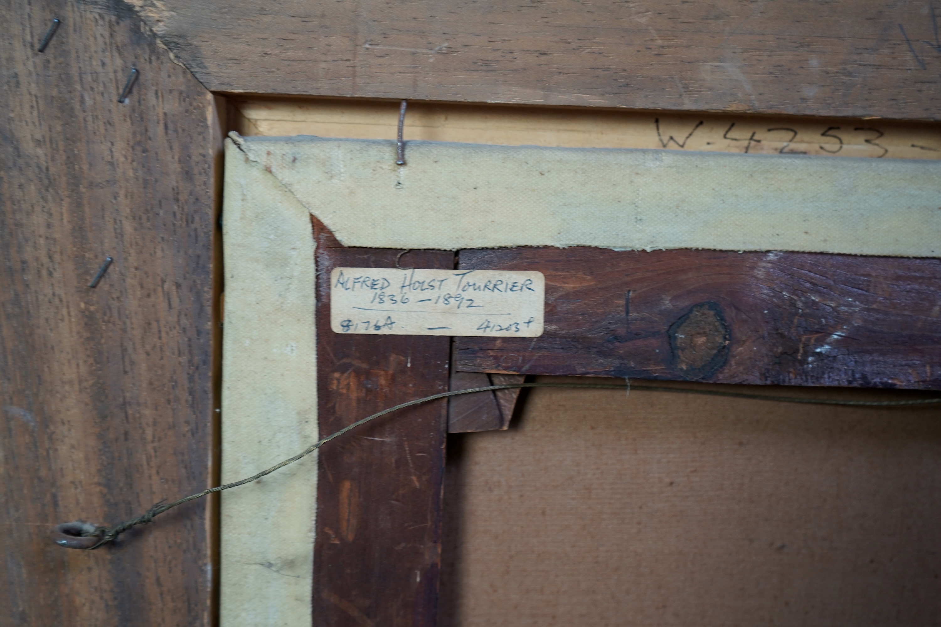 Alfred Holst Tourrier, British 1836-1892, A gentleman wearing Tudor dress seated before an arched window
